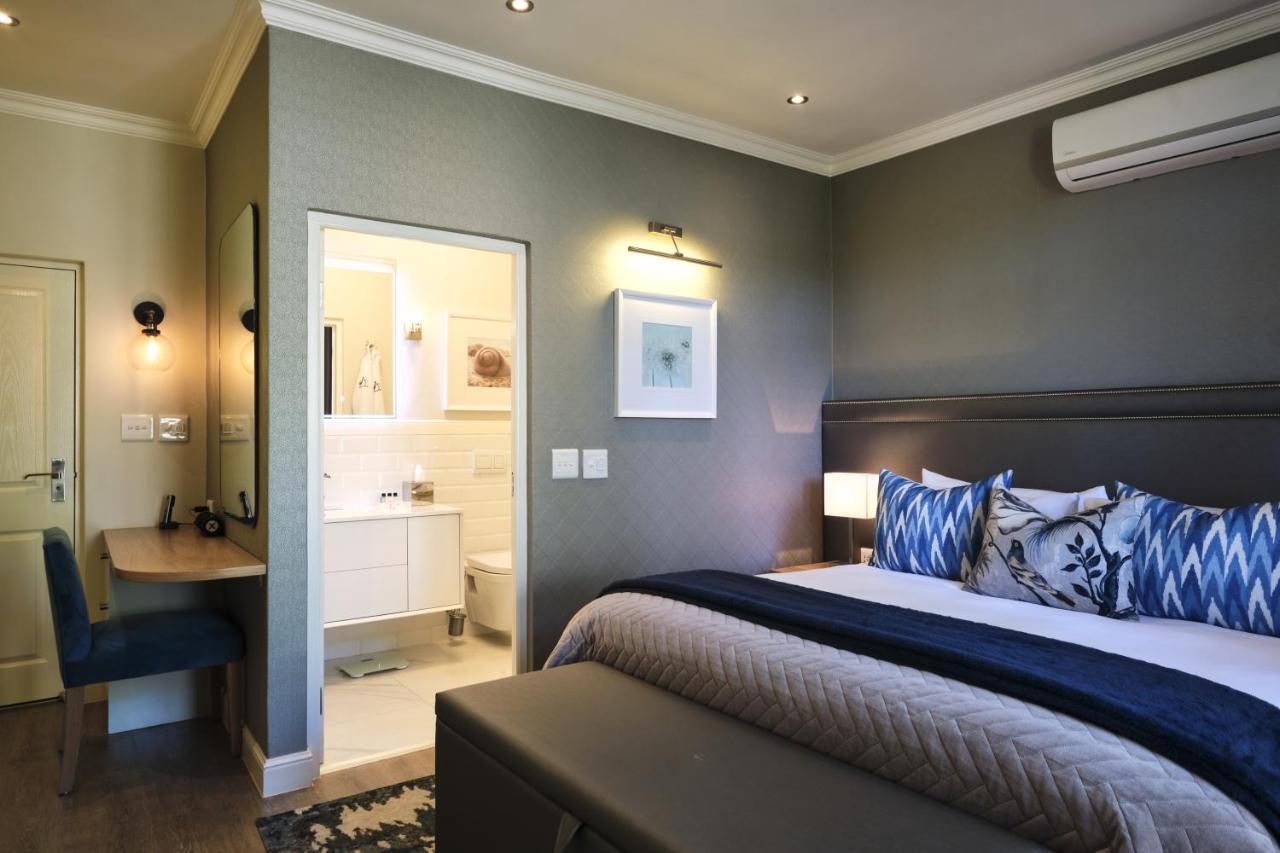 Alluvia Boutique Winery & Luxury Accommodation Stellenbosch Exterior photo A bedroom at the Oyster Box