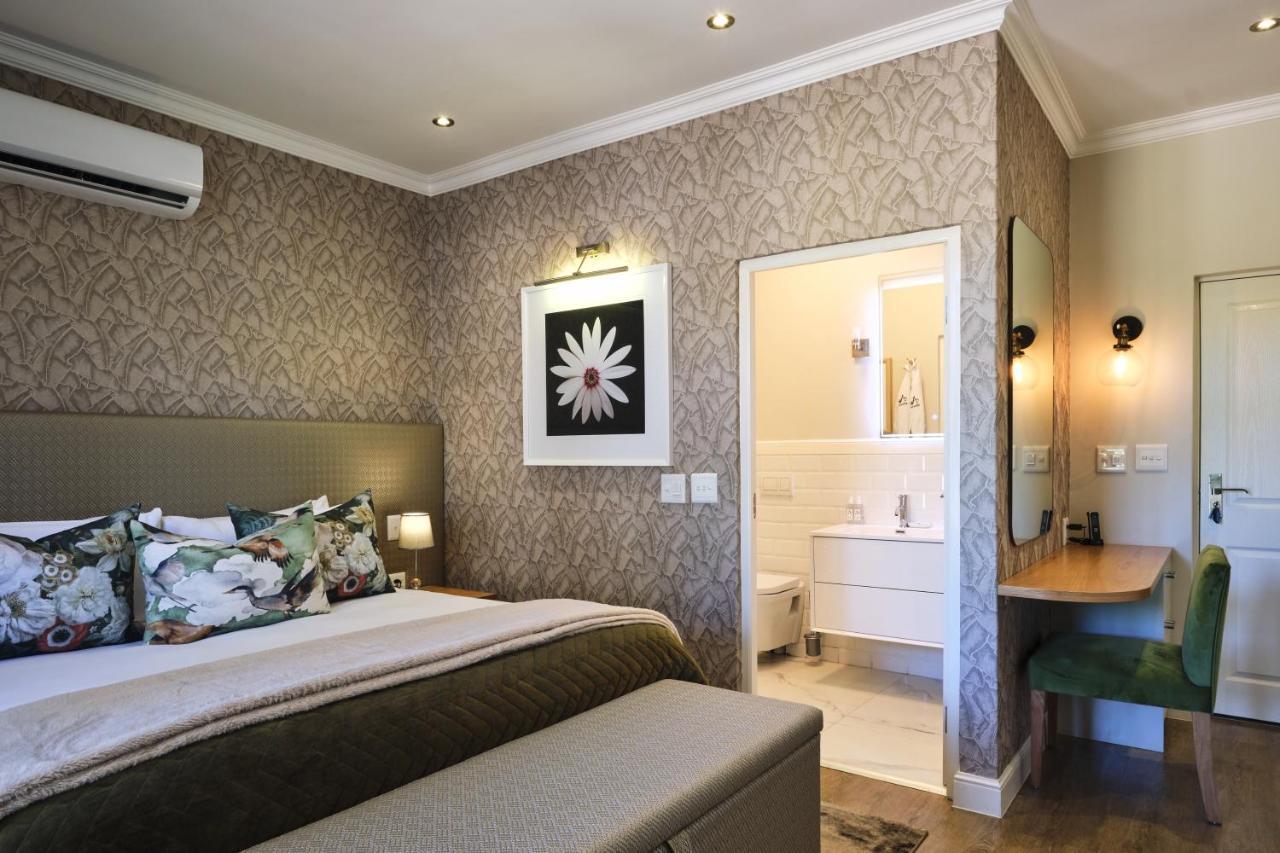 Alluvia Boutique Winery & Luxury Accommodation Stellenbosch Exterior photo A bedroom at the Cape Heritage